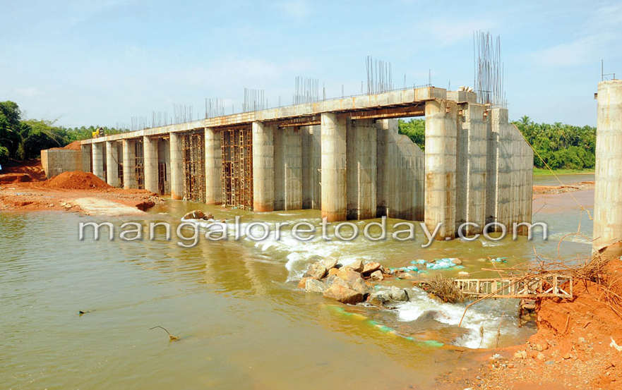 Surge in river water washes away construction equipment 1